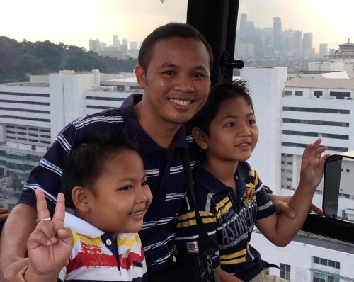 Eddy ( I Made Kusnadi) and his two sons