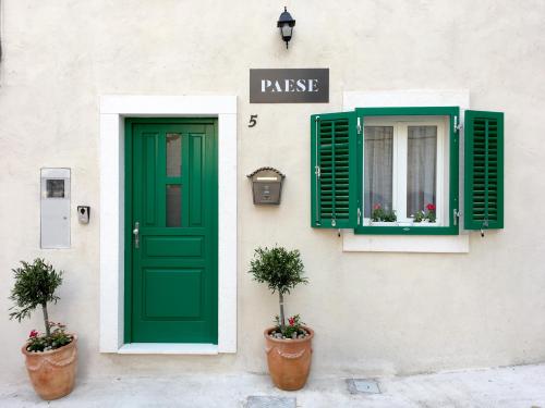 Central Split Apartments and Rooms Paese
